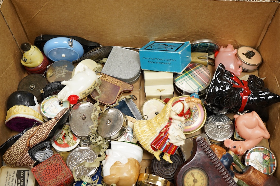 A collection of late 19th and 20th century novelty / souvenir sewing related tape measures